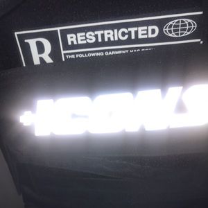 Vest that lights up in the dark size medium color black and white